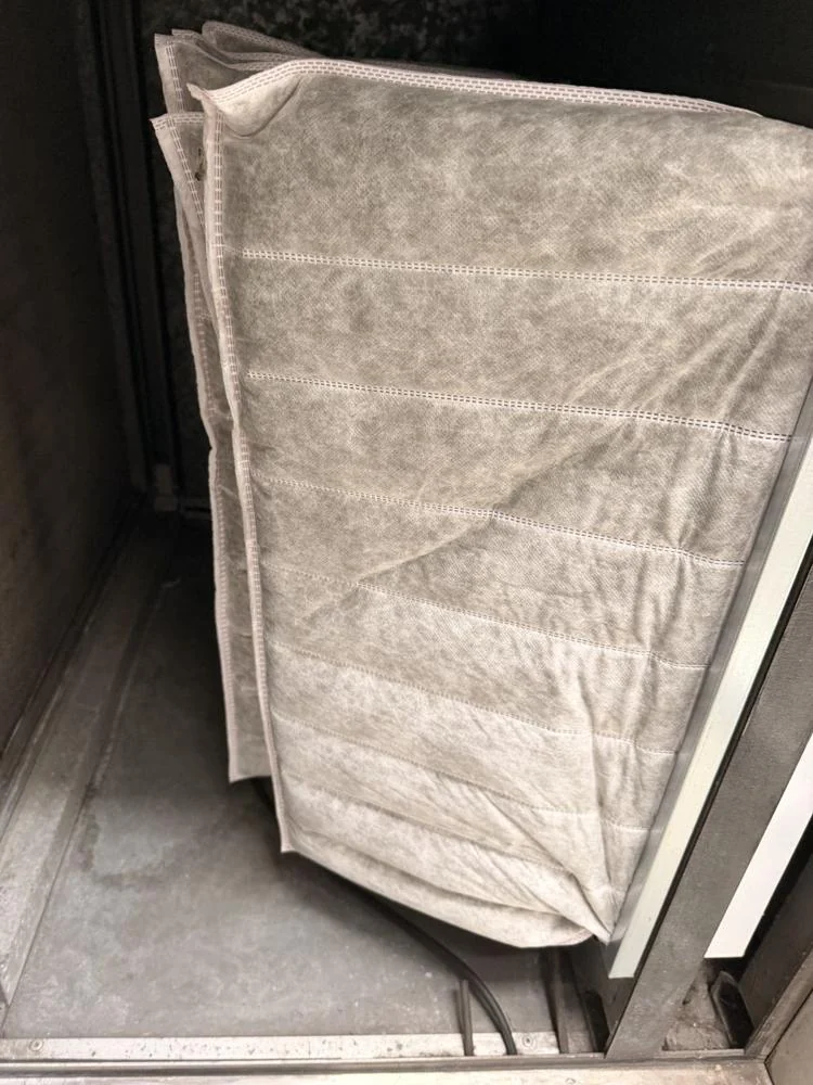 Bag filter and its mounting frame photographed inside an air handling unit during a validation survey